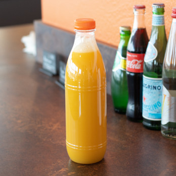 Botella de plástico féria de 1 L con tapón de rosca