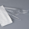 Set de cubiertos reutilizables 4 en 1 con tenedor, cuchillo, cuchara de postre y servilleta blanca en una bolsa individual