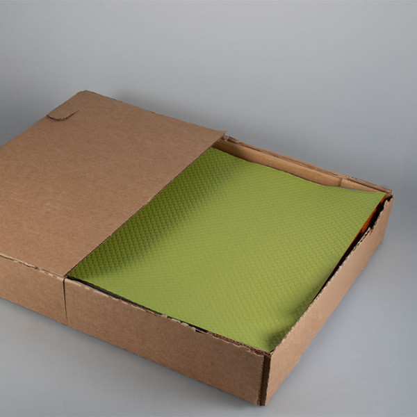 Mantel individual de papel verde anís vendido en caja dispensadora