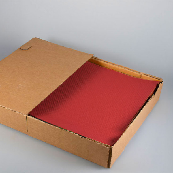 Mantel individual de papel rojo vendido en caja dispensadora