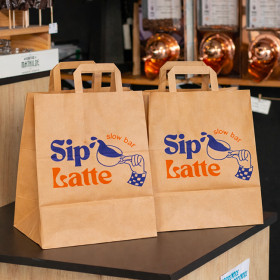 Venta de bolsas de papel personalizadas en color con asas planas